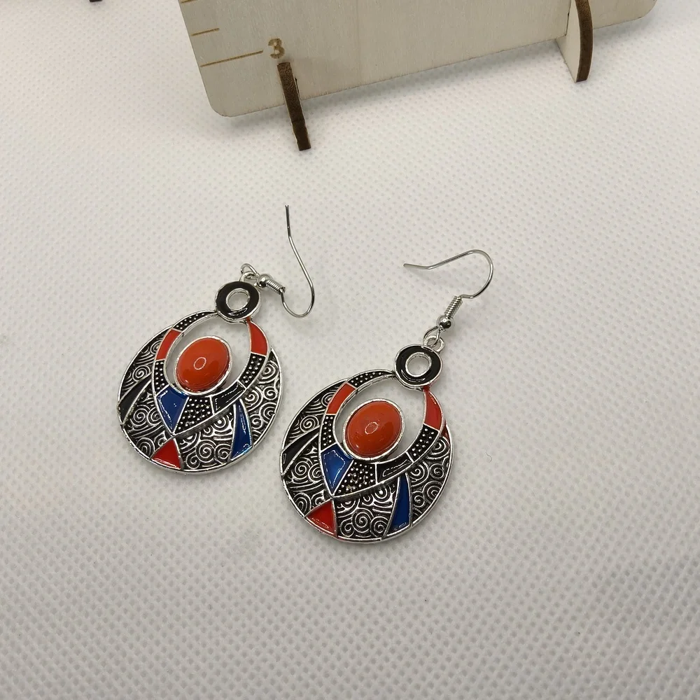 Red and‎ Blue Circular Earrings with Intricate Design